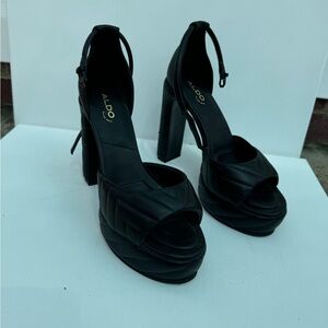 ALDO women’s black pumps.